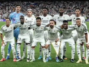 Real Madrid's players pose for a team picture before the start of during the UEFA Champions League 1st round day 1 football match between Real Madrid CF and Stuttgart VFB at the Santiago Bernabeu stadium in Madrid on September 17, 2024. (Photo by Thomas COEX / AFP)