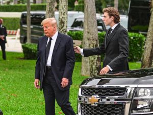 Former US President Donald Trump and his son Barron Trump
