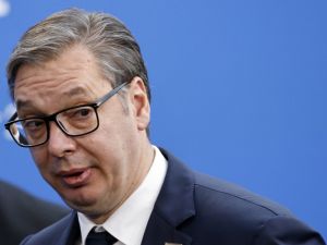 Serbia's President Aleksandar Vucic answers journalists questions upon arrival for the European Political Community Summit in Budapest, on November 7, 2024. (Photo by Ludovic MARIN / AFP)