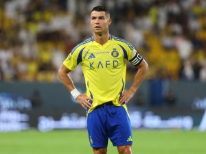 Nassr's Portuguese forward #07 Cristiano Ronaldo looks on during the Saudi Pro League football match between Al-Ahli and Al-Nassr at at al-Awwal Stadium in Riyadh on September 13, 2024. (Photo by Fayez NURELDINE / AFP)