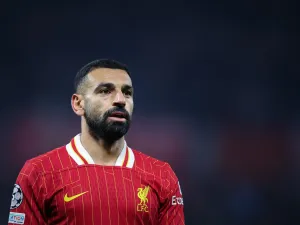 Liverpool's Egyptian striker #11 Mohamed Salah reacts during the UEFA Champions League football match between RB Leipzig and Liverpool FC in Leipzig, eastern Germany on October 23, 2024. (Photo by Ronny Hartmann / AFP)