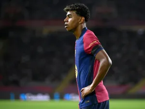 Barcelona's Spanish forward #19 Lamine Yamal stands on the pitch during the Spanish league football match between FC Barcelona and Sevilla FC at the Estadi Olimpic Lluis Companys in Barcelona on October 20, 2024. (Photo by Josep LAGO / AFP)