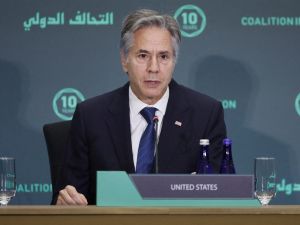 One Coalition member was killed and two were wounded from two different nations