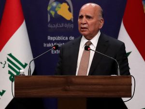 Iraqi FM calls on Iran-backed factions to lay down arms