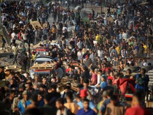 Israeli airstrikes kill dozens of displaced Palestinians in Gaza school bombing 