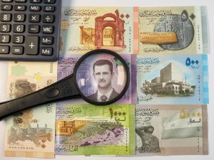 Syria replaces banknotes, dropping Assad's portraits amid warnings of challenges
