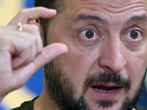 Ukraine's President Volodymyr Zelensky gestures as he speaks during his press-conference in Kyiv on July 15, 2024, amid Russian invasion in Ukraine. - Ukrainian President Volodymyr Zelensky said on July 15,2024 (Photo by Sergei SUPINSKY / AFP) Zelensky announces plan to seize Russian assets through international guarantees