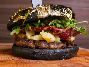 Artisanal black sandwich filled with meat burgers
