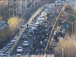 Iran president urges government to heed protesters’ demands after rial hits historic low