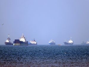 In this picture obtained from Iran's ISNA news agency on May 4, 2026, vessels are pictured anchored in the Strait of Hormuz off Bandar Abbas in southern Iran. Photo by AMIRHOSSEIN KHORGOOEI / ISNA / AFP