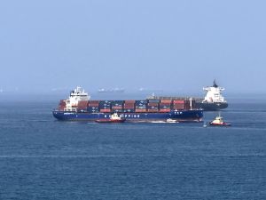 Foreign cargo ship runs aground in Strait of Hormuz as Iran defends shipping controls