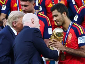 FIFA President Infantino and US President Trump hand World Cup trophy to Spanish player Rodri