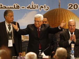 Palestinian president Mahmud Abbas gestures as he chairs a Palestinian National Council meeting in Ramallah /AFP	