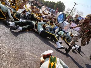 Iranians scramble to the ground during the attack in Ahvaz, Iran (MORTEZA JABERIAN /AFP) Iranians scramble to the ground during the attack in Ahvaz, Iran (MORTEZA JABERIAN /AFP)