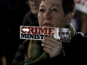 Israeli protesters participated in a march demanding that Israeli Prime Minister Benjamin Netanyahu resign over corruption allegations (AFP)