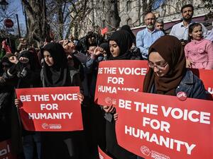 Women hold placards during a rally against the imprisonment of women and children in Syria, near Hagia Sophia in the Turkish city of Istanbul, on March 8, 2019, as International Women's Day is being celebrated around the world. 
Ozan KOSE / AFP 