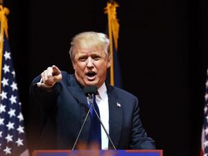 US Republican presidential hopeful Donald Trump speaks to the crowd during a rally February 8, 2016 in Manchester, NH. (AFP/Don Emmert)