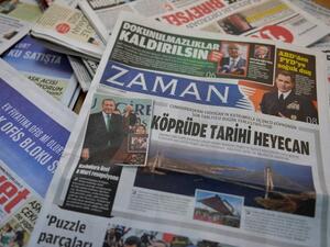 A photo taken in Ankara on March 6, 2016 shows the front page of the first new edition of the Turkish daily newspaper Zaman, which had staunchly opposed the president, now with articles supporting the government since its seizure by authorities. (AFP/Adem Altan)