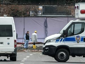 Forensic experts investigate the scene of the explosion on March 14, 2016 in Ankara the day after a suicide car bomb ripped through a busy square in central Ankara killing 37 people and wounding 125, officials said. (AFP/Ozan Kose)
