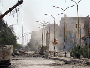 Destruction is seen in the historical city of Palmyra in central Syria on March 29, 2016. (AFP/STR)