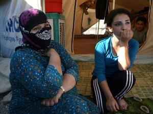 Thousands of Syrian women continue to languish in prisons in regime-controlled areas (AFP/File Photo)