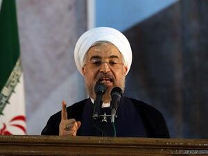 Iranian President Hassan Rouhani delivers a speech in Tehran. (photo credit: AFP/ATTA KENARE)