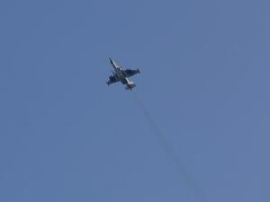 A picture taken on Feb.1, 2018, shows a Sukhoi-25 fighter jet flying over the Syrian city of Saraqib, southwest of Aleppo. Rebel fighters shot down a Russian plane over Syria's northwest Idlib province on Feb. 3, the Syrian Observatory for Human Rights said, taking its Russian pilot captive. (OMAR HAJ KADOUR / AFP)