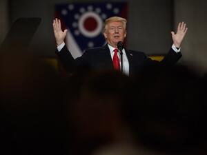 U.S. President Donald Trump speaks to a crowd gathered at the Local 18 Richfield Facility of the Operating Engineers Apprentice and Training, a union and apprentice training center specializing in the repair and operation of heavy equipment on Mar. 29, 2018 in Richfield, Ohio. President Trump's remarks centered upon infrastructure investment in the economy and labor statistics. 
(JEFF SWENSEN / GETTY IMAGES NORTH AMERICA / AFP)