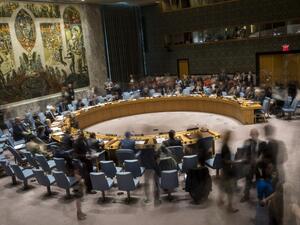 (FILES): In this long exposure photograph, the United Nations Security Council meets concerning the situation in the Middle East, at UN headquarters, April 26, 2018 in New York City. Israel claimed that Iran is using Syria to build a new military front against Israel. Among other topics discussed in the Security Council meeting included discussion about the mass protests along the border fence between the Gaza Strip and Israel. 
(Drew Angerer / GETTY IMAGES NORTH AMERICA / AFP)