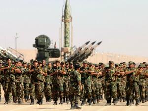 Soldiers from the self-styled army of Libyan Strongman Khalifa Haftar take part in a military parade in the eastern city of Benghazi. (Abdullah Doma / AFP)