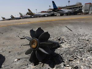 The remains of an explosive device at an airport in Tripoli. (AFP/File)