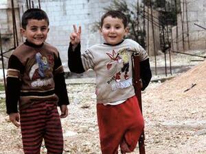 Syrian boys pose for a photo. (Facebook) 