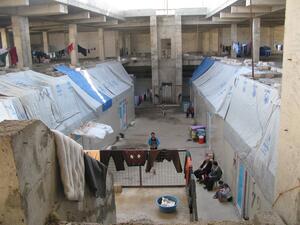 Christian refugees who fled Daesh living in the abandoned construction site of a mall in Erbil, Kurdistan. (Facebook) 