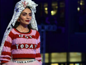 A model presents a creation by MUA MUA Dolls' designer Ludovica Virga during Arab Fashion Week in Dubai on November 17, 2017 (Source: AFP)