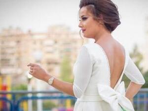 كندا حنا تحتفل بعمادة أطفالها 