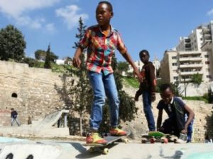 Children in the Jordanian capital Amman enjoy some fun at a skate park in Amman (AFP/File Photo)	