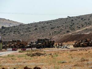 Turkish troops at the Syrian-Turkish border (AFP)