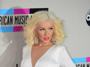 Christina Aguilera has revealed that Ryan was caught up in a 'Mickey Mouse Club' love triangle as he fancied Britney but all the girls only had eyes for Justin. (Source: FREDERIC J. BROWN - AFP)