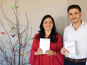 Omar Abu Agha poses with Skyline Sushi partner Natasha Quariab at the book launch in Amman, on Saturday (Skyline Sushi)