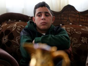 Mohammed Fadel Tamimi,Palestinian boy previously shot in the face and severely wounded by an Israeli soldiers (AFP/File Photo)