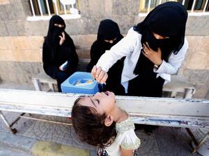 A Yemeni child receives polio vaccination during an immunization campaign at a health center  (AFP/File Photo)