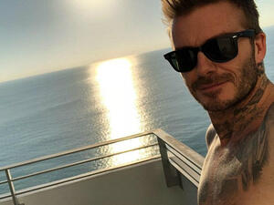 'Look stressed there Becks!' Cocky David shared a sun-soaked snap from aboard a boat in Miami... prompting fellow-footballer Steven Gerrard to tease him for fleeing London's snow (Source: David Beckham -
 Instagram)