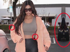 Photo tricks! Kim Kardashian suffered a photoshop fail, on an image she posted to Instagram on Saturday which squashed a car in the background and bent the curb (Source: Kim Kardashian - Instagram)