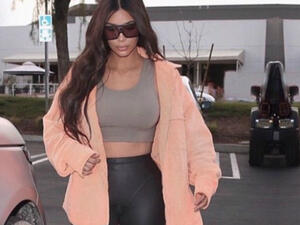 'What Photoshop fail?' Kim Kardashian defiantly reposted  THAT squashy car photo on Monday ... and blamed a fan on the edit (Source: Kim Kardashian - Instagram)