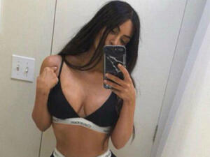 Lining it up: Kim Kardashian has been accused of using Photoshop again, after posting a sizzling lingerie-clad image on Instagram on Wednesday evening (Source: Kim Kardashian - Instagram)