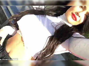 Dressed in a cropped white top and black nylon track pants with an elastic waist, the Keeping Up with the Kardashians star painted her lips a variety of colors (Source: Kylie Jenner - Snapchat)