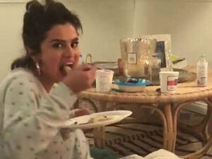 Letting loose: Selena Gomez was spotted in a cute video of herself and a friend about to gorge on pizza and ice cream with no regrets on Friday (Source: Selena Gomez - Instagram)