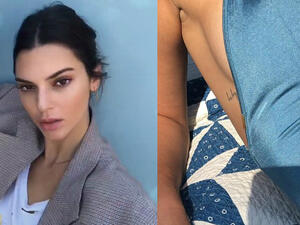 Fresh ink: Kendall Jenner appeared to tease a new tattoo of the word 'baby' on her right rib online Saturday (Source: Kendall Jenner - Instagram)