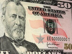 A weak dollar means the potential for a global currency war is strong. (File photo)