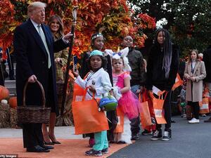 Kids lined up down the South Lawn to see the president and first lady (AFP)